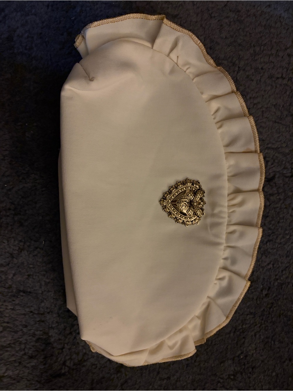 NWOT- Dolce and Gabbana Cream Ruffled Clutch with Gold Crest Accent